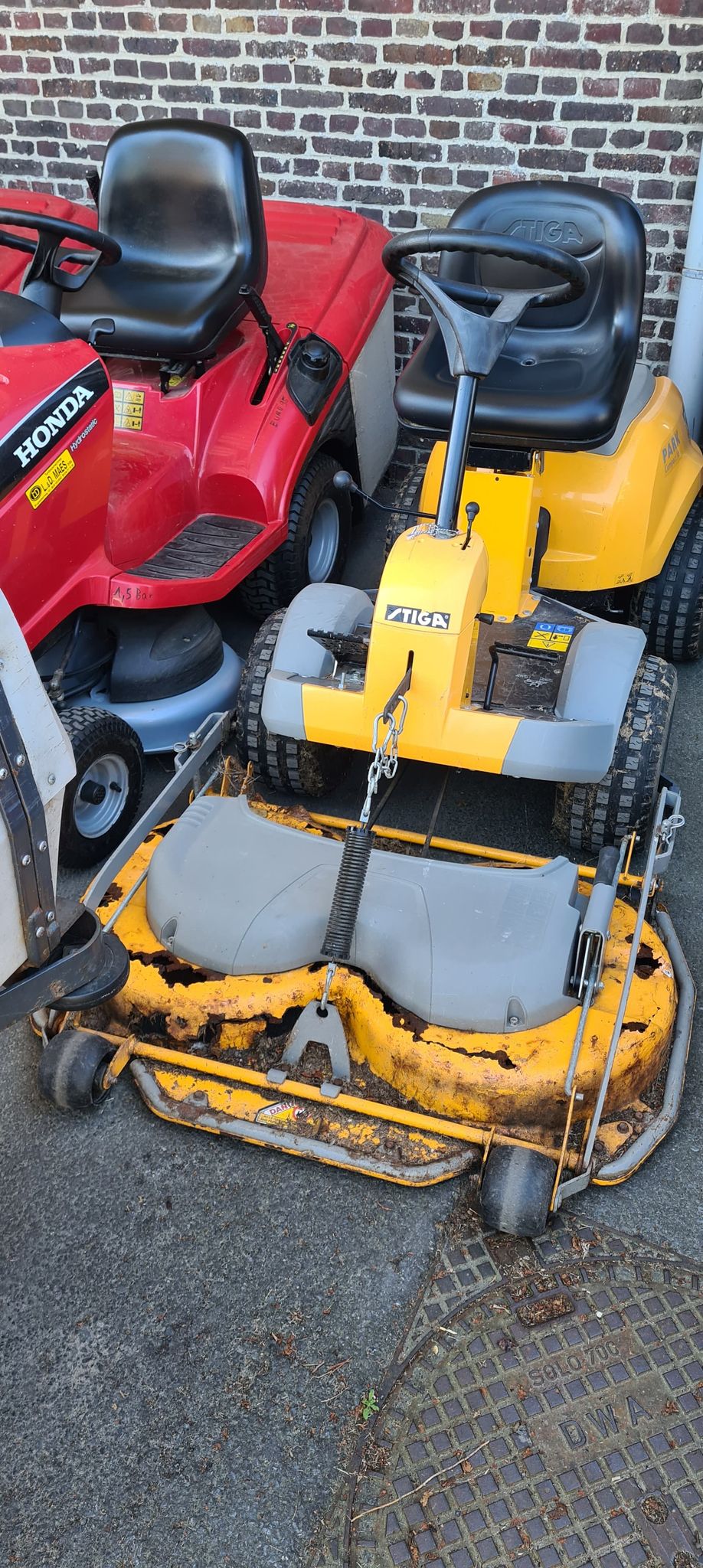 Žoliapjovė traktoriukas